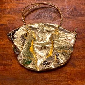 Gold Elizabeth Arden makeup/toiletry bag/purse/tote